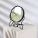 The desktop mirror is a suspended “circle”, bilateral, with an increase, D mirror surface 9 cm, black color