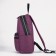 A backpack with a zipper, "saxi", outer pocket, lilac color