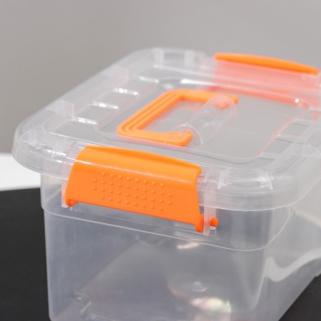 The storage container is plastic, 20 × 15 × 11 cm, a cover with a handle on a latch, matte-2