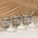 A set of ceramic cans for spices on the metal stand “Leaves”, 200 ml, 3 pcs, white color