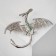 Brooch "Dragon" flying, green color in silver