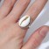 The ring "shell" is sea, beige color in silver, dimensionless