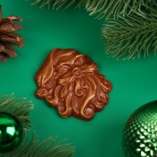 New Year. Figure made of milk chocolate 