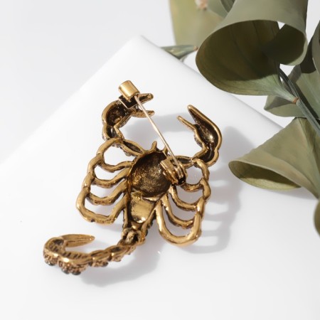 Brooch "Scorpio" in armor, black-green color in black gold-1