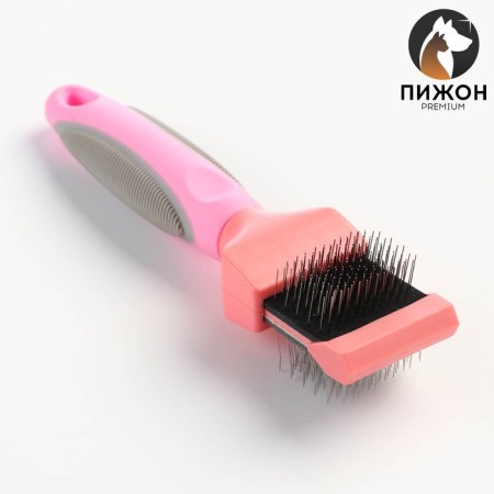 A bilateral flexible packer with straight and bent teeth, 20.5 x 4.5 cm, pink