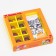 Box for 8 sweets + chocolate, with a window, "love is...", orange, 17.7 x 17.85 x 3.85 cm