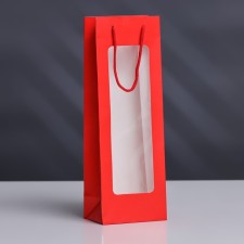 A package for a bottle with a plastic window 12.5 × 8.5 × 36 cm, red