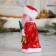 Santa Claus "Long fur coat, with a Christmas tree" 17 cm