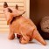 Soft musical toy "Dinosaurus", 42 cm, beige color