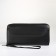 Male purse-clate on a zipper, black color