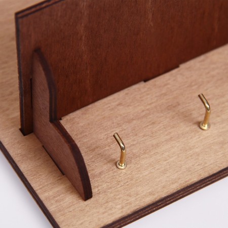 The keywood is wall -mounted with the pocket shelf.-4