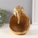 Souvenir Polystone stand "Elephant with a large stone bowl" gold 13x15x18 cm