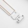 The ultraton connector for the busbar (ceiling-wall) is white 2.6x2.6x2.6 cm