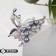 Brooch "Butterfly" with a pearl wing, the color is gray in silver