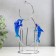 Dolphins pendulum opposite each other with a ring of 16 x 9.5 x 18 cm