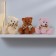 Soft toy "Bear with a bow", with hearts, color mix