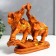 Polystone souvenir "Two cash elephants on a bill and coins" under a tree 18.7x21x7 cm