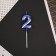 Candle for the cake, the number "2", blue.