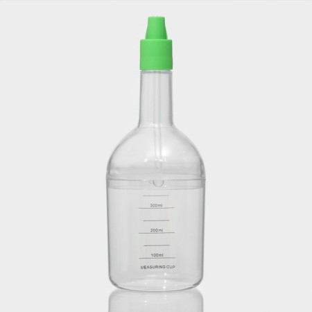 A bottle of oil "Miracle", 380 ml, 29 × 8.5 cm, color mix-12