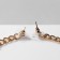 Earrings with rhinestones “crosses” chain, white-black color in gold