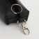 Key of zipper, length 16 cm, ring, carbine, black color