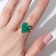 The ring "Heart" is smooth, the color is green in gold, dimensionless
