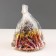 New Year's candle "Bump with spruce decor", 7 cm, brown mix