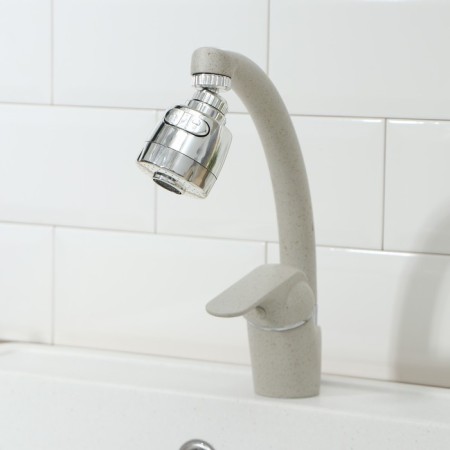 A crane nozzle to save water with variable pressure and jet angle-1