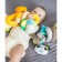 Stretching - spiral with toys arc on a stroller / crib for babies 0+ "Pandochka", Baby Me