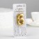 A candle in a cake on a “polyhedron” skewer, a number 6, 7 cm, gold