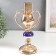 Summary Metal on 1 candle "plexus of rings. Blue marble element" gold 29x14x14 cm
