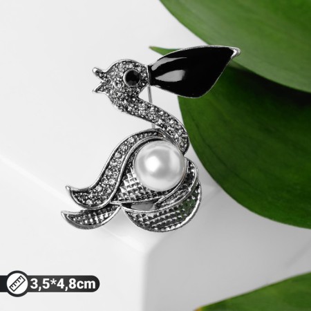 Pelican brooch with a pearl, the color is black and white in black silver