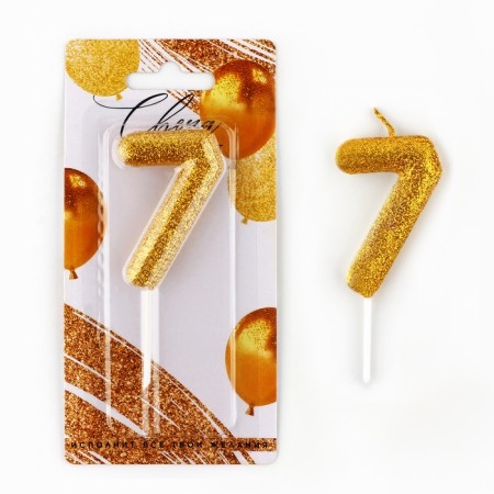 A candle for a cake, a number, brilliant “7”, gold, 4 x 10 cm.