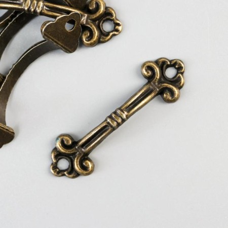 Handle for the casket Metal "Antik" bronze 4.6x1.3 cm