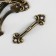 Handle for the casket Metal "Antik" bronze 4.6x1.3 cm