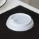 A plastic disposable lid for a white glass, with a valve, d = 9 cm