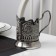 The cup holder "George the Victorious", D = 61 mm, nickel, with blackening