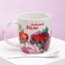 Ceramic mug with a spoon of 