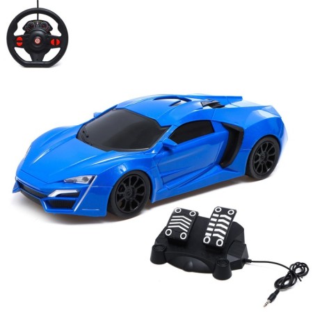 The radio -controlled "coupe" machine includes pedal and steering wheel, works on batteries, the color is blue