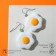 Earrings plastic "goodies" glazing, white-orange color