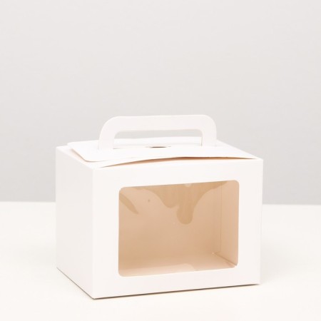 The box is folding, with a window and a handle, white, 10 x 14 x 10 cm