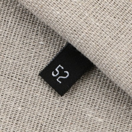 Textile strip “52”, 4.6 x 1.1 cm, black color