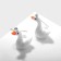 Earrings "Geese", white-orange color in silver