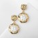 Earrings with pearls "exclusive" a crumpled circle, color gold