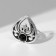 Ring of "ethnic" drop, black color in black silver, dimensionless