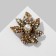 Brooch "Flower" overflow, colored in black gold