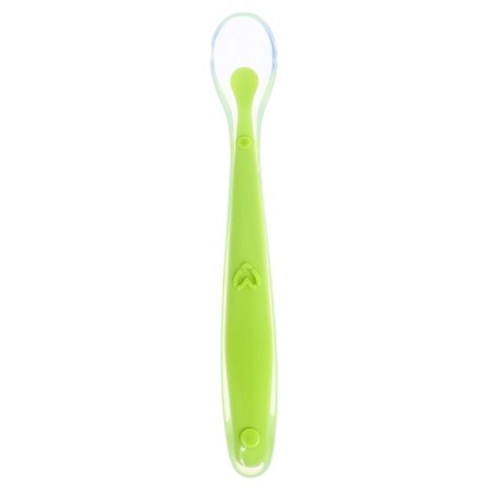 A spoon for a nursery, for the first feeding, in a container, green-1