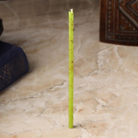 The candle is a magic wax "achievement", with cloves, 16x0.6 cm, green-1