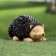 Garden figure "Hedgehog is heating" 18x10x10cm