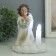 Souvenir Polystone Light "Angel with a pipe at a candle on a cloud" Squeezes 7.3x10x14 cm